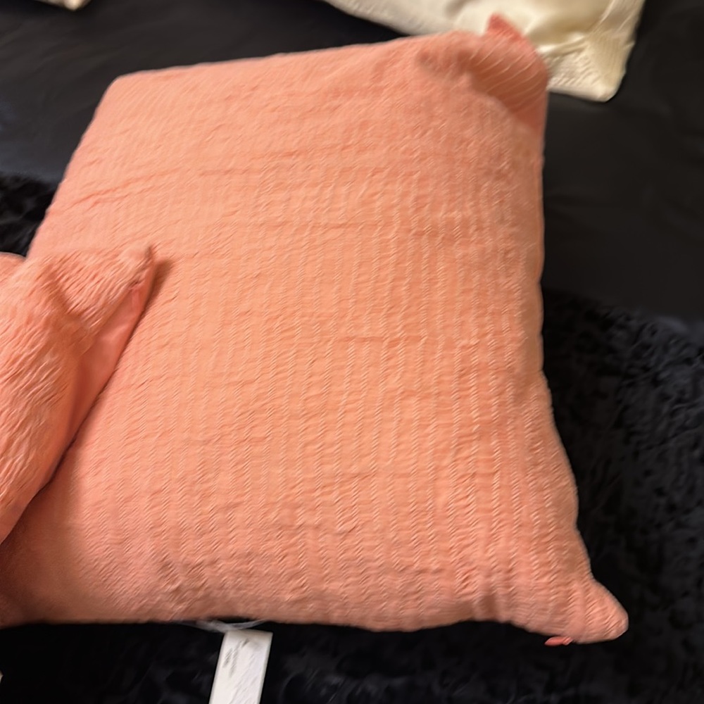 2 Peach pillows 2 DKNY very coral ish peach  beautiful and new
